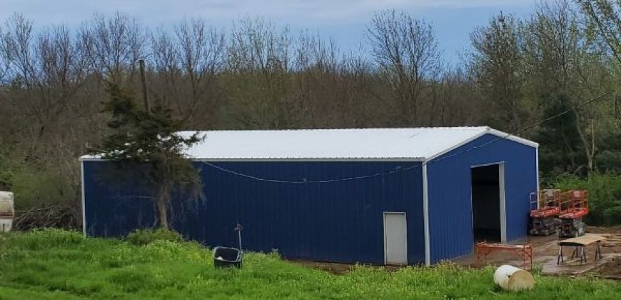 40x60x14 – Cobalt Blue Walls + Polar White Trim – Carlisle, IA