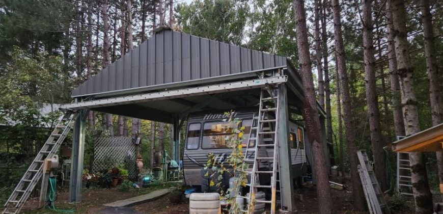 24x40x12 – Carport – Charcoal Gray Roof & Endwalls + Ash Gray Trim – Mora, MN